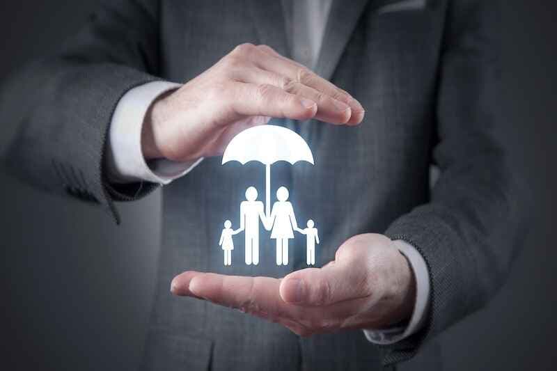 Man protect family symbol with a umbrella.