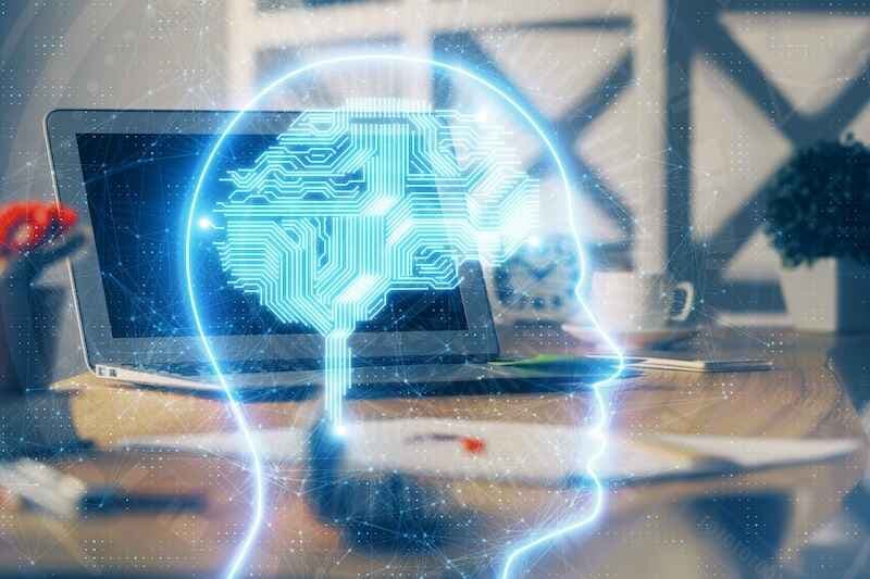 Double exposure of work table with computer and brain sketch hologram. Brainstorming concept.